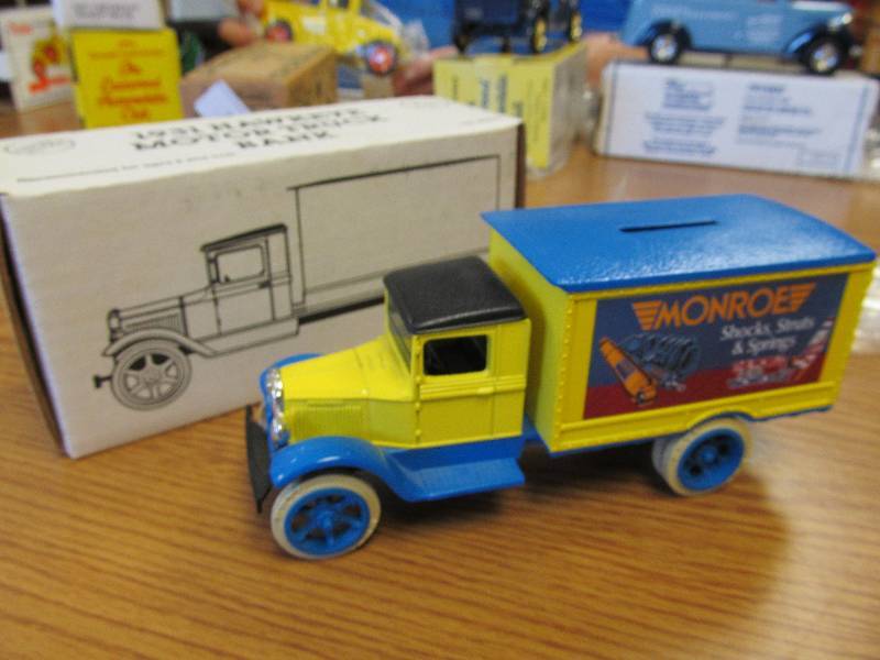 lot 14 image: 1931 Hawkeye Monroe Shocks Delivery Truck 134 Diecast Bank