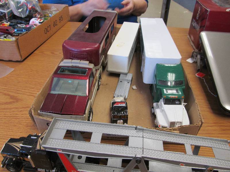 lot 35 image: Lot of 4 Semi Truck & Trailer Metal Toys