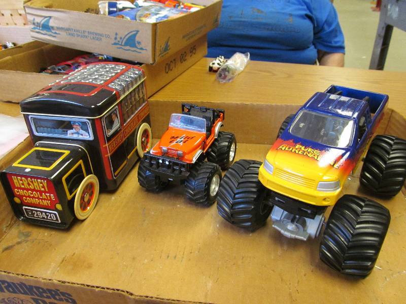 lot 36 image: Lot of 2 4WD (Monster Truck) & Tin Collectable Box