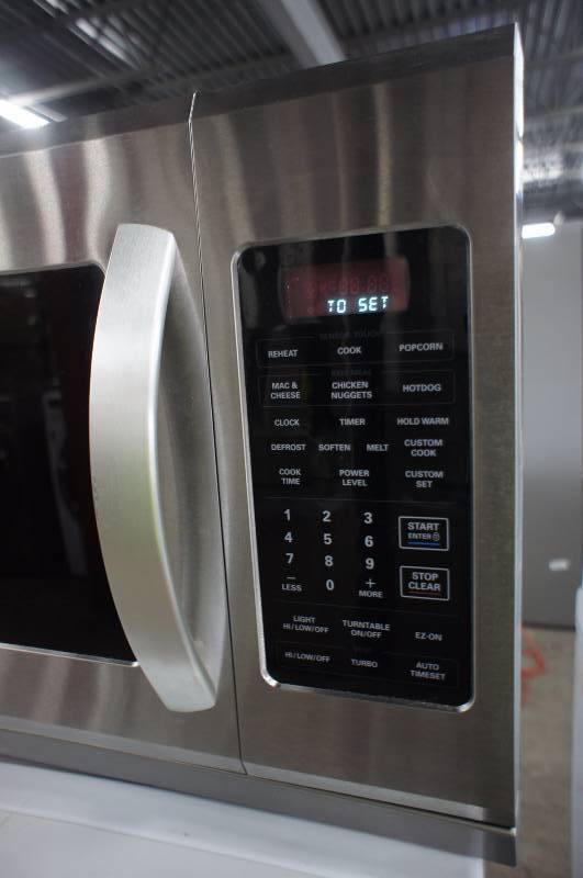 lot 11 image: LG Microwave - Model # (LMHM2016ST)