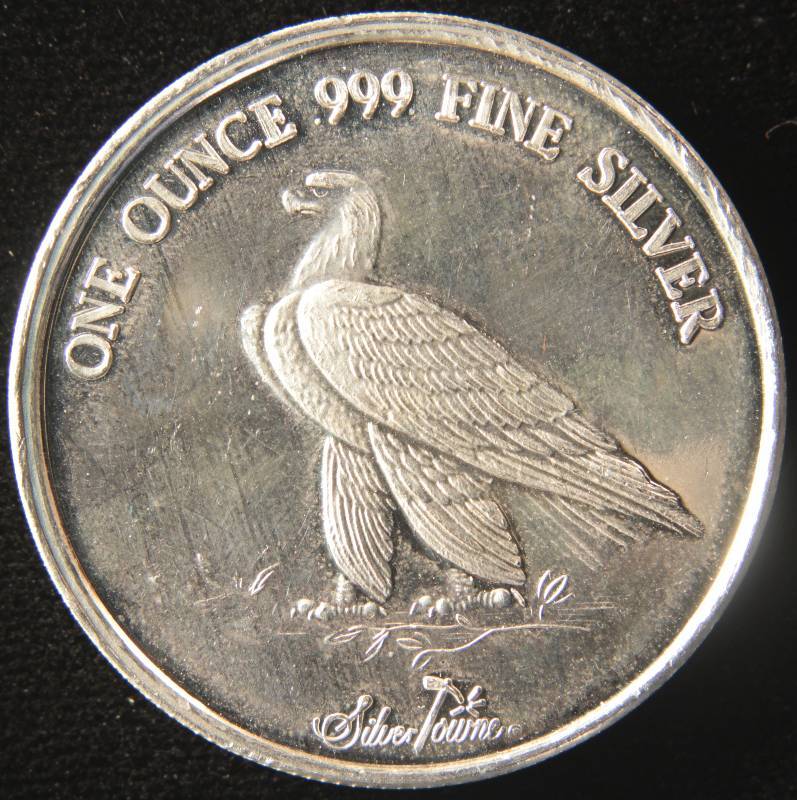 lot 62 image: 1 TROY Oz. .999 FINE SILVER INDIAN ROUND SILVERTOWNE