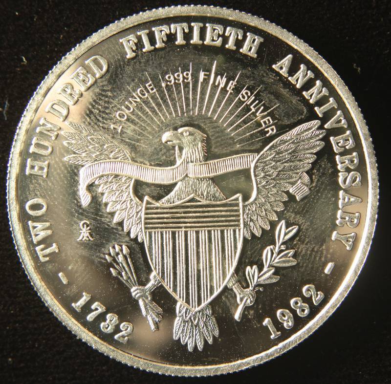 lot 11 image: 1 TROY Oz. .999 FINE SILVER 1982 WASHINGTON ROUND