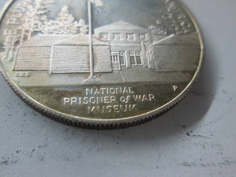 lot 59 image: National Prisoner of War Museum Coin