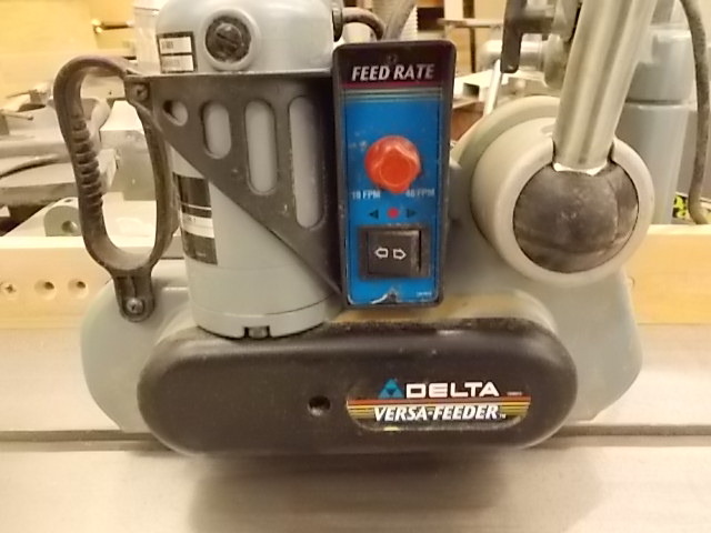 lot 212 image: Delta Versa Power Feeder Model 36-8...