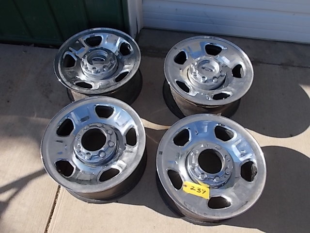 lot 239 image: Ford Rims, From 2008-09 F350, New ...