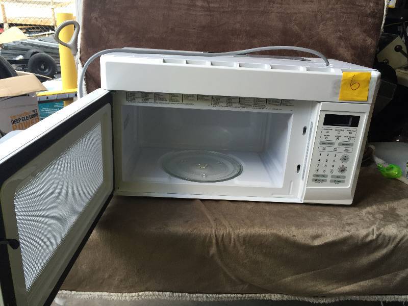 lot 6 image: Magic Chef 1.6 cu. ft. Over-the-Range Microwave in White