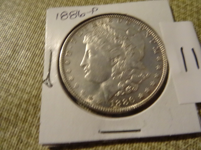 1886 P one dollar