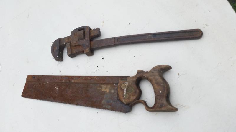 Saw and Pipe Wrench