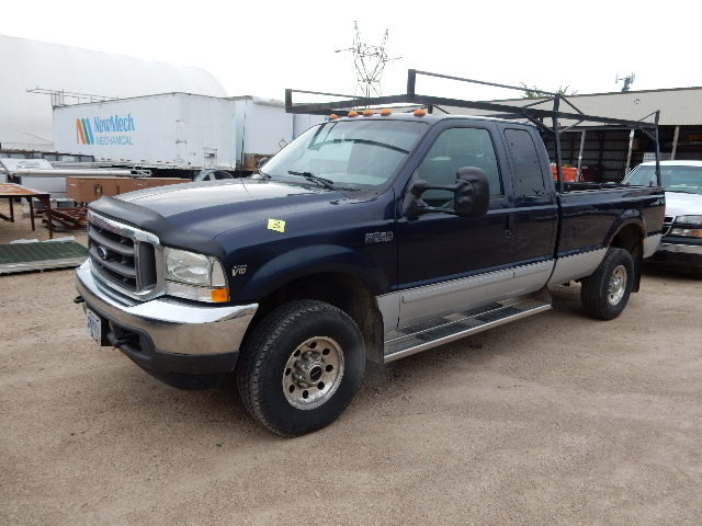 lot 3 image: 2002, Ford F 350 Truck.. 4 Wheel Drive with Ladder Racks.