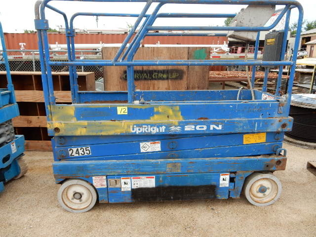 lot 12 image: UPRIGHT, 20N Scissor Lift.. 20 ft High.  Has Extendable Bed.  This runs, but No guarantee on the battery life.