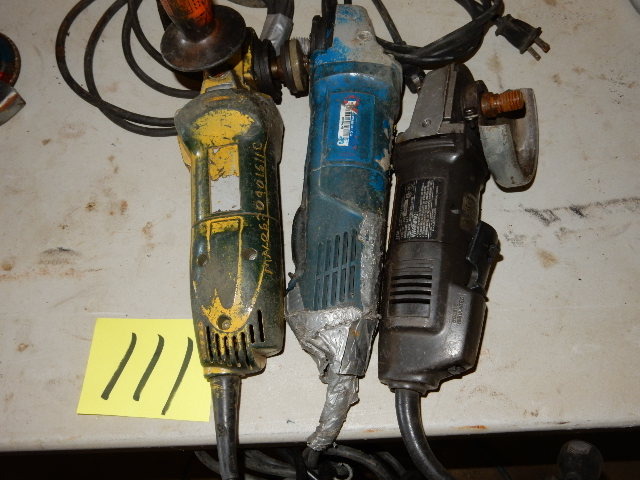 lot 111 image: Two Bosch and one Black and Decker Four and One Half Inch Angle Grinders