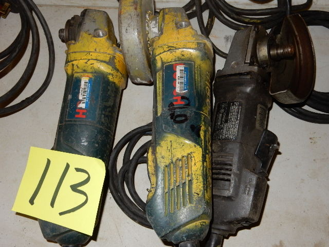 lot 113 image: Two Bosch and One Black and Decker Four and One Half Inch Angle Grinders