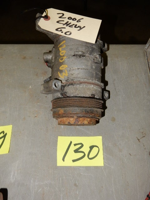lot 130 image: An Air Conditioning Compressor from a 06 Chevy Truck, we are quite sure it would fit trucks from other years.