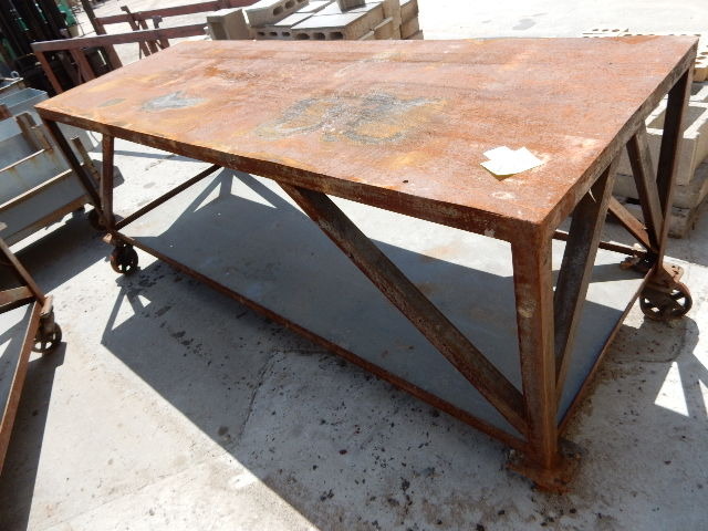 lot 217 image: Heavy Steel Table.  With bottom rack.. On wheels
