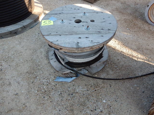 lot 53 image: Spool of 12 in Cable.. 24 in diameter x 15.. About 12 of spool