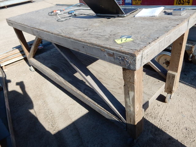 lot 72 image: Heavy Duty Table, Plywood and Lumber.. Has Wheels