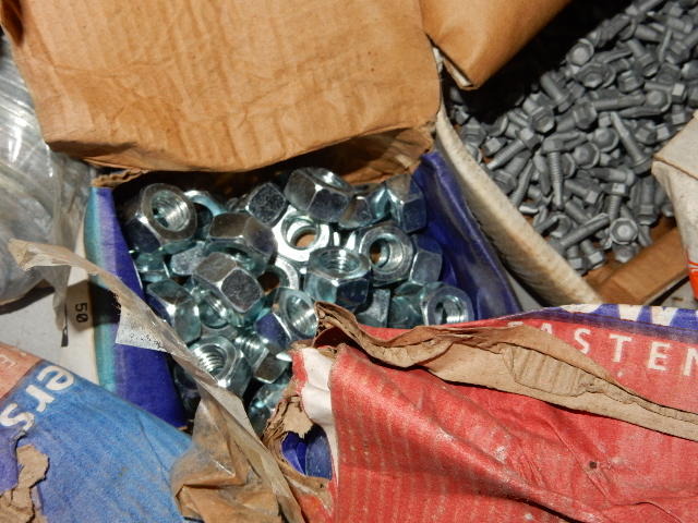 lot 300 image: 12 in hex nuts, washers.  Climaseal screws