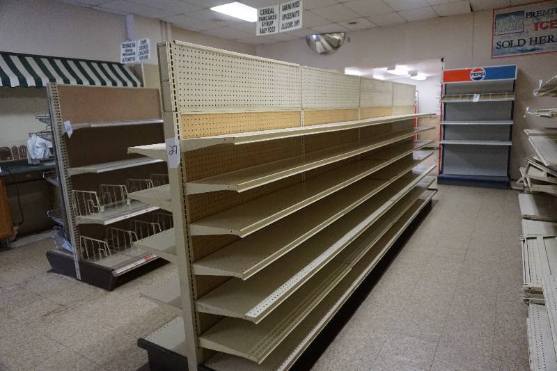 lot 27 image: Metal Retail Two Sided Shelving Unit