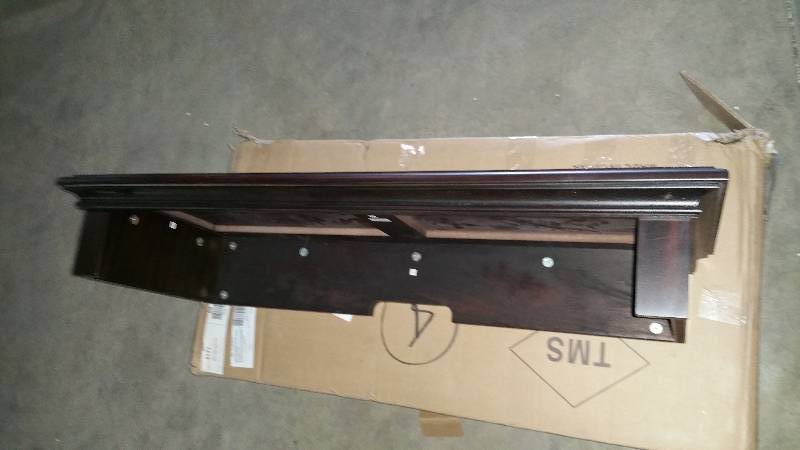lot 215 image: Top of a Cabinet Wall Shelf