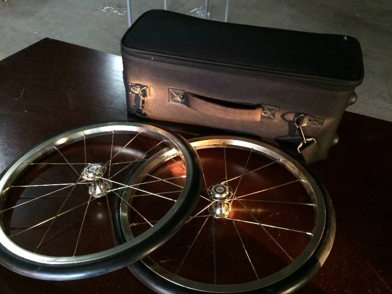 lot 352 image: Two 16 Spoke Wheels, and a Padded Caring bag