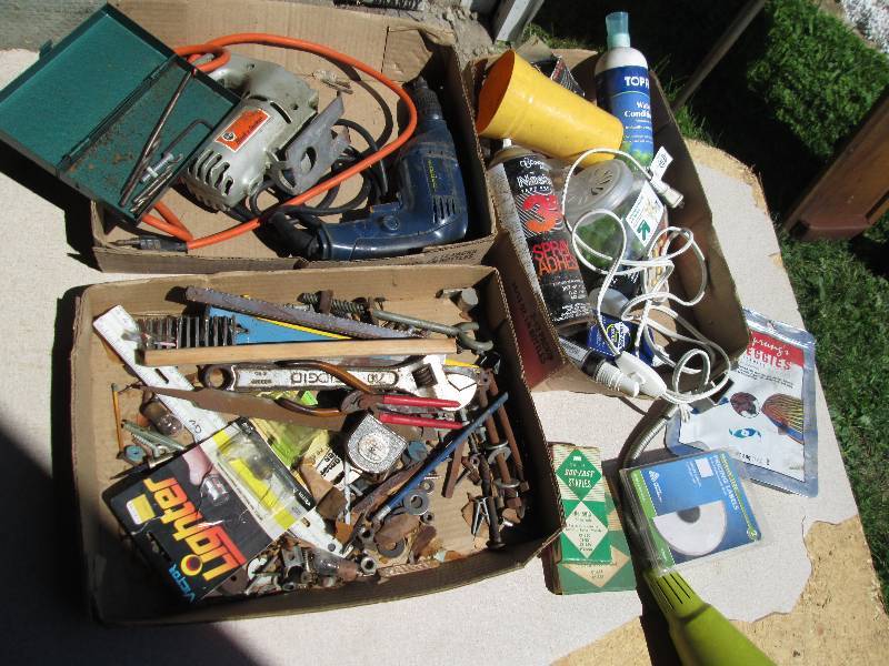Lot of tools, hardware, price lable...