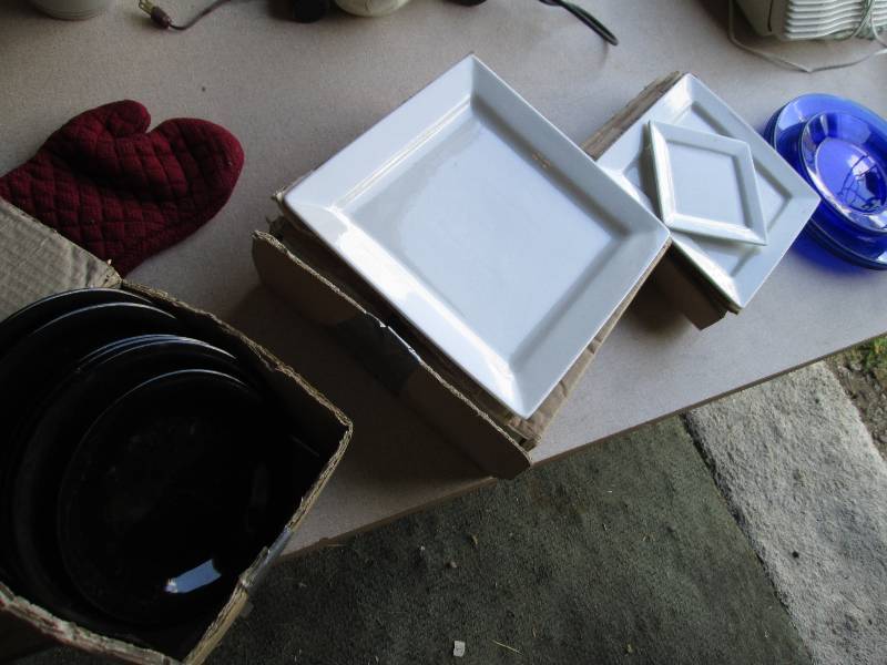 Lot of plates and dishes, some are ...