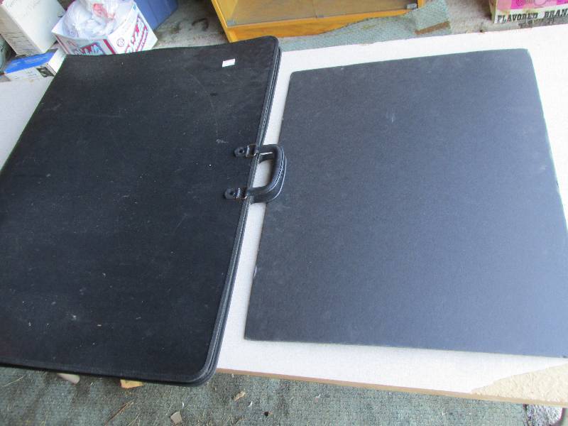 Art jacket suitcase, and a black pi...