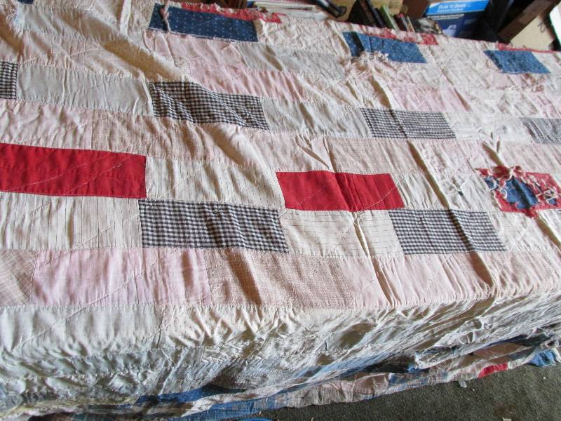 Hand made quilt, some ripped areas ...