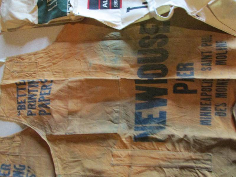 Lot of vintage canvas work aprons, ...