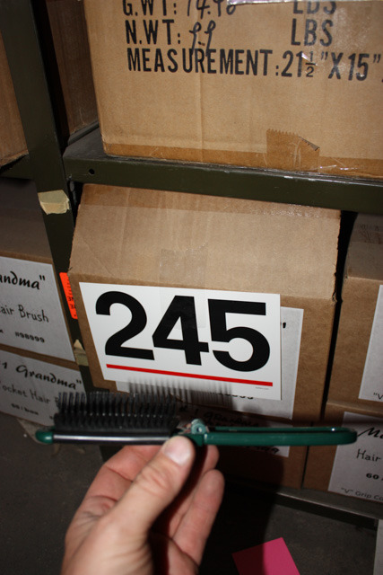 lot 245 image: Folding Hairbrushes