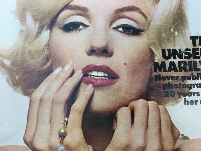 Two vintage life magazines featuring Marilyn Monroe and spacewalk