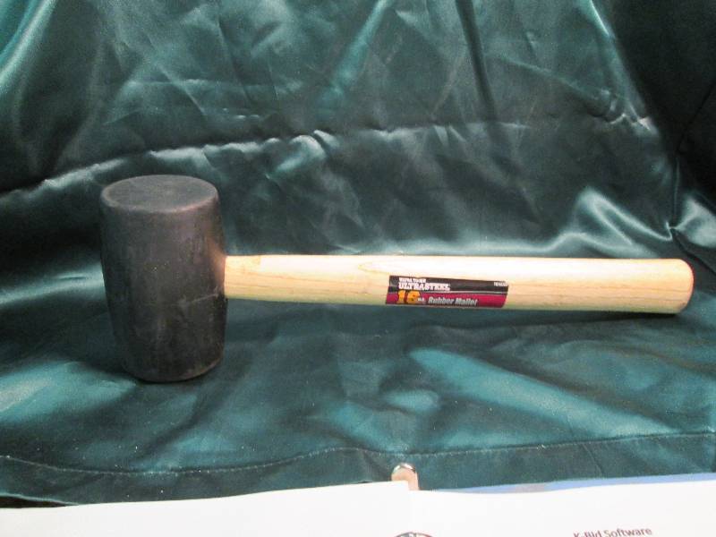 lot 284 image: Ultra tough ultra steel 16 0z. Rubb...