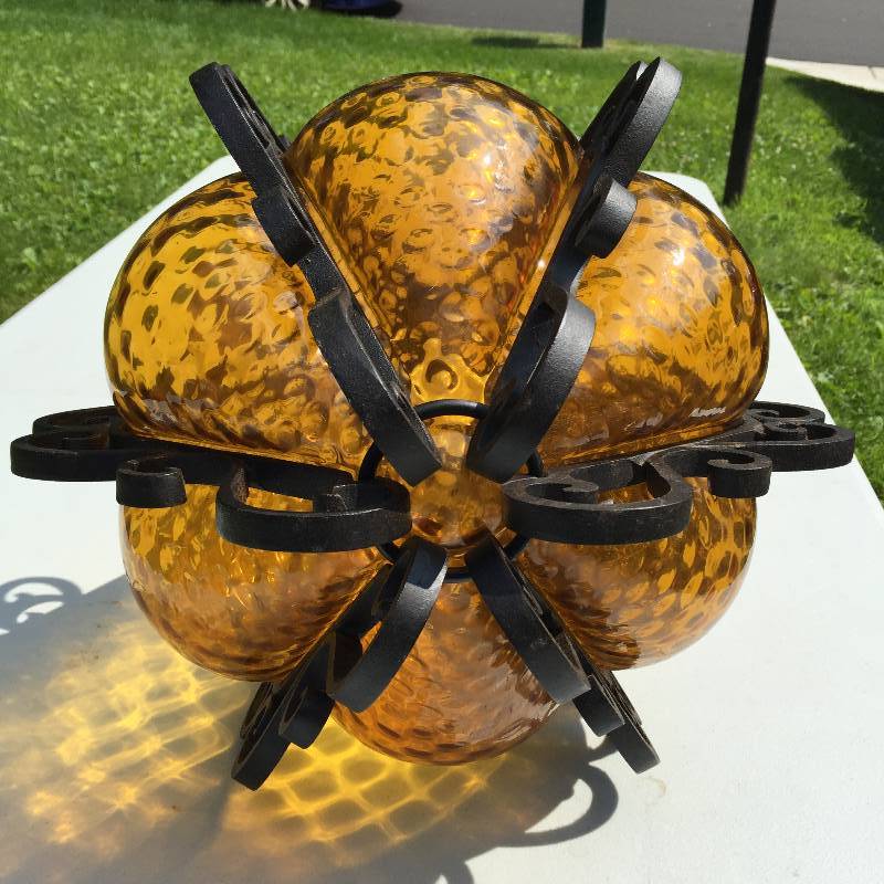 lot 7 image: Unbelievable vintage hanging light fixture, extra large wrought-iron with amber glass globe