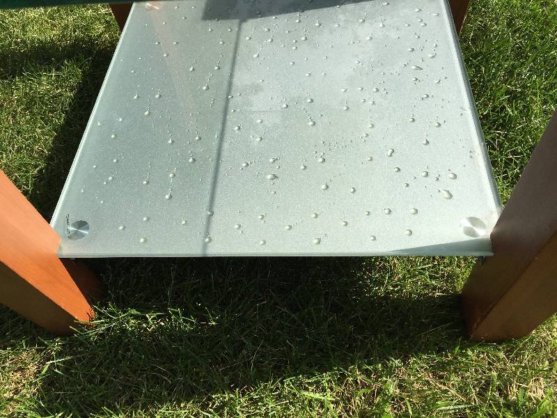 lot 66 image: Modern Glass top side table with Drip frosted glass base