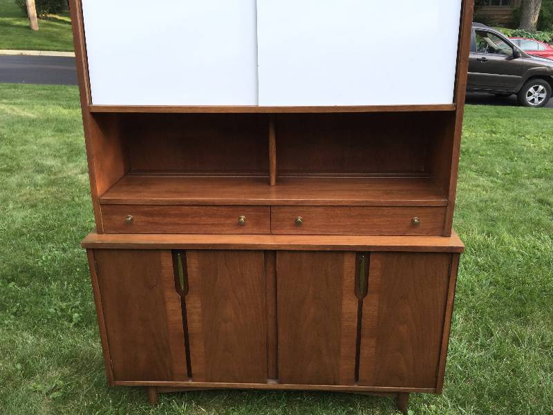 lot 1 image: Midcentury modern Book Case Est..value $450.00