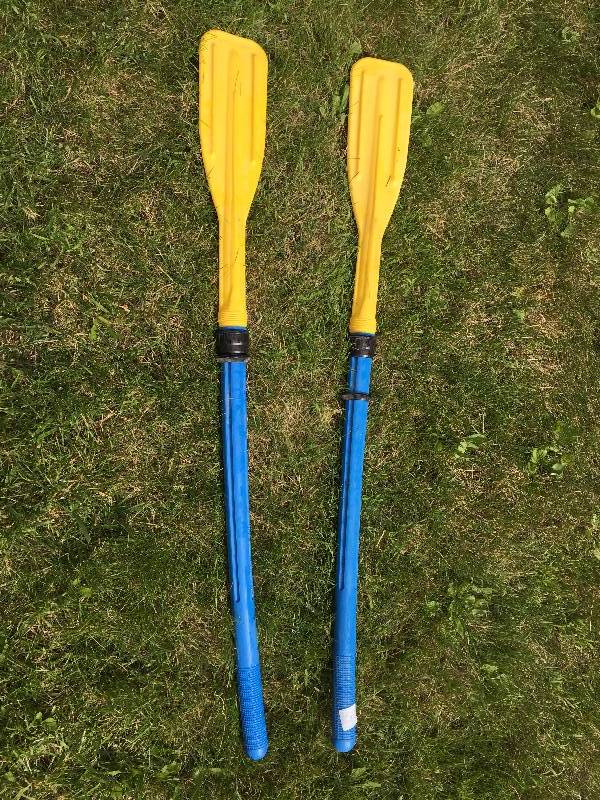 Large lot of ski poles hockey stick snowboard and raft paddles