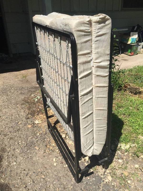 Twin sized folding camping bed with mattress