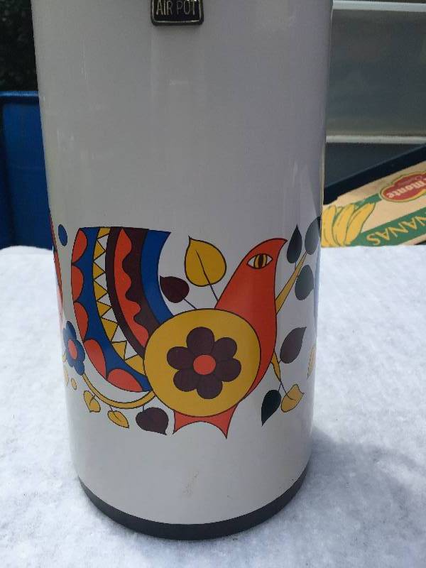 Vintage thermos and air pot.