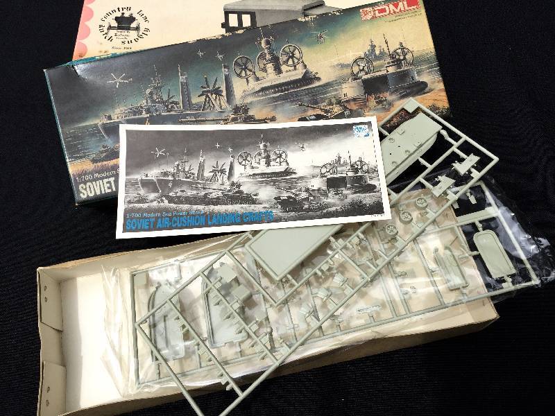 lot 9 image: Lot of 3 collectible model cars All Ertl and are complete and unopened inside.
