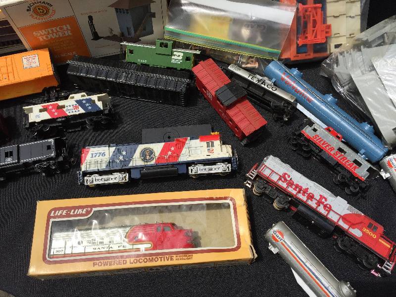 lot 13 image: Lot of what appears to be 3 train sets.. A lot of items in this large collectible lot Very large box