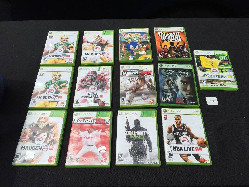 lot 22 image: Large lot of 13 X box games mostly sports one call of duty.