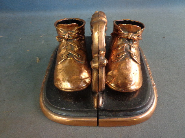 lot 122 image: Bronzed Pair of Baby Boot Bookends