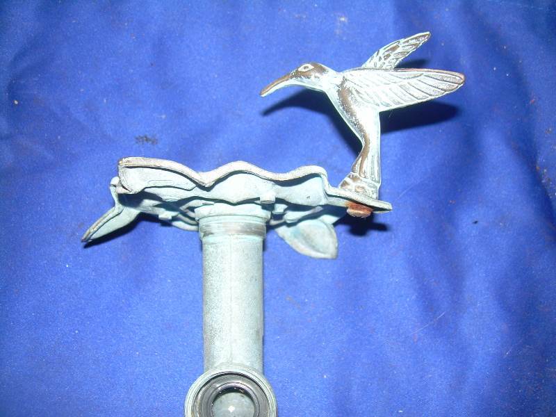 antique metal sprinkler