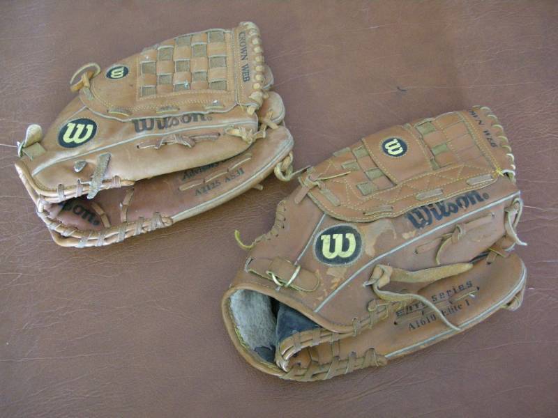2 Wilson ball gloves