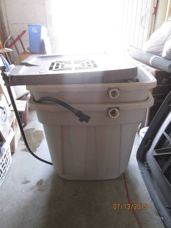 Pair of rain water resevoirs with s...