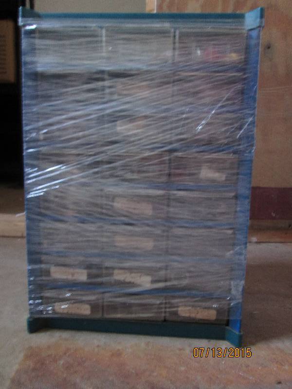 22 drawer organizer full of various...