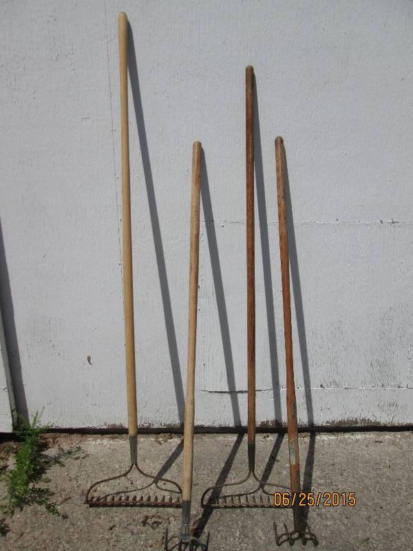 Lot of 4 heavy duty garden rakes...