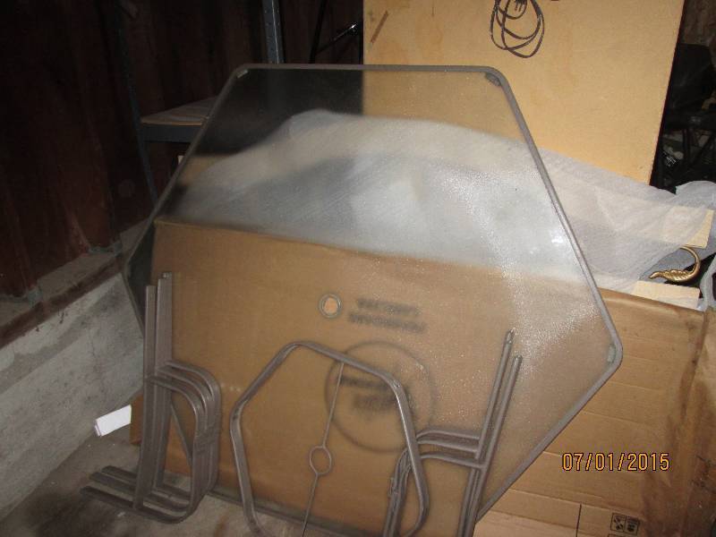 Large hexagon glass patio table. Al...