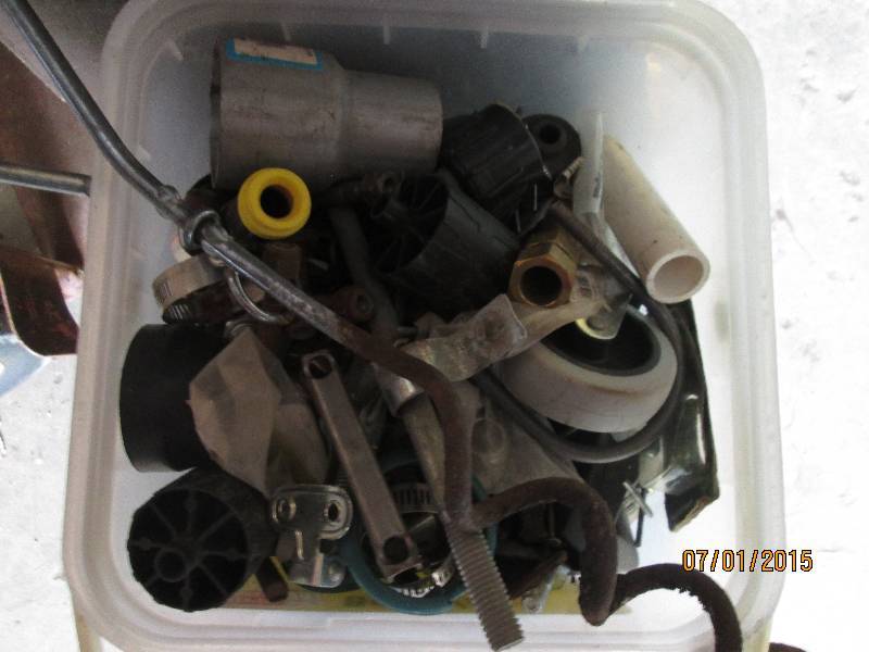 Small pail of various small tools a...