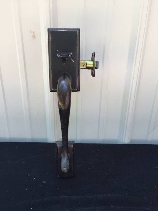 lot 15 image: Kwikset Bronze Door Knob